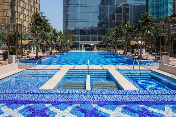 Rooftop pool at MGM COTAI in Macau, offering luxury wellness, leisure and resort-style relaxation.