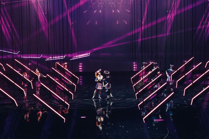 Miao Songs | Transcendent scene from Macau 2049 at MGM Theater, where traditional Miao cultural performance meets futuristic lighting and immersive stage design.
