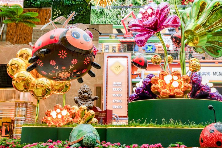 Ladybug and flower installations at Garden Wonderland in The Spectacle at MGM COTAI, creating an immersive family-friendly entertainment experience.