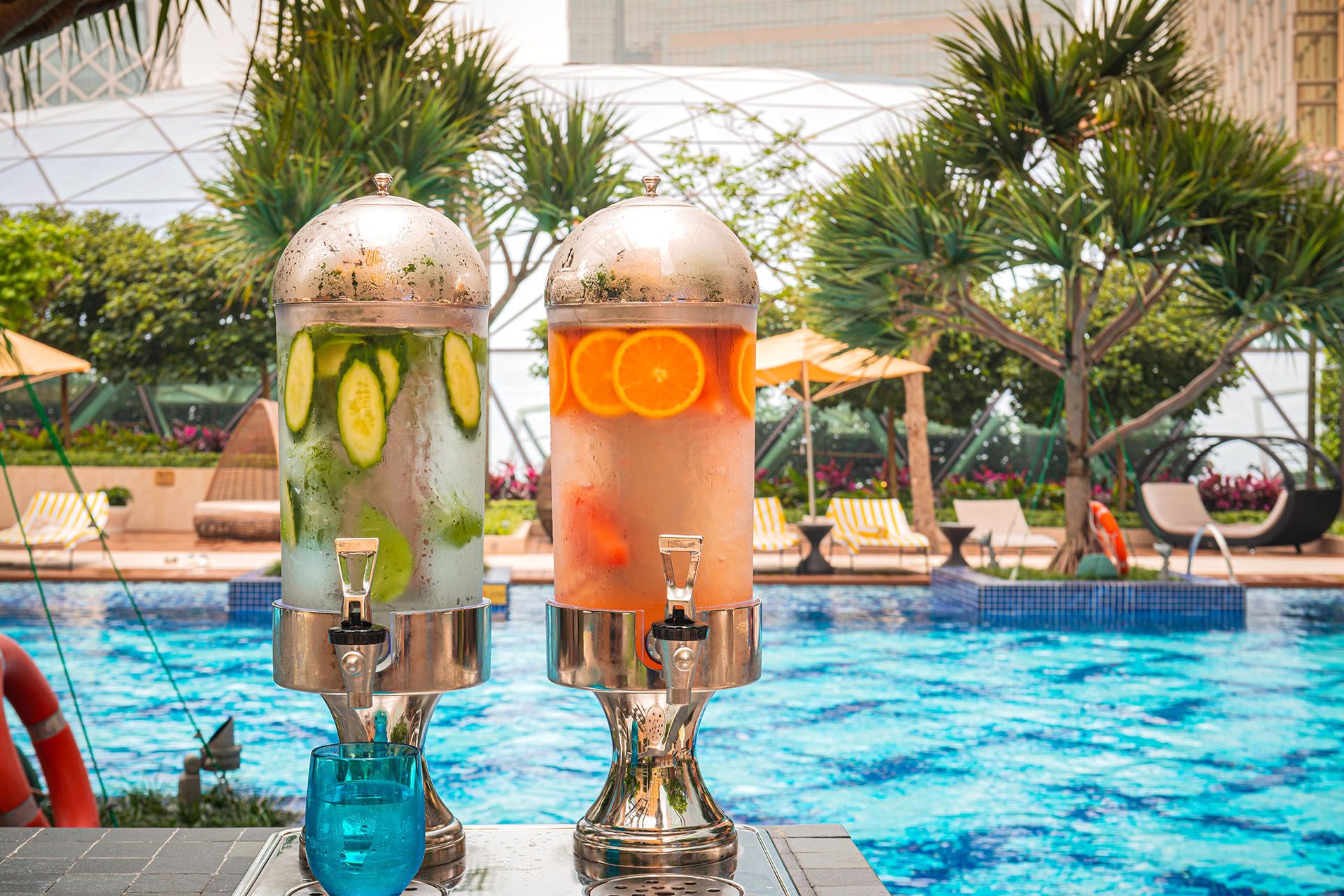 Rooftop pool refreshment station at MGM COTAI featuring fruit-infused water as part of a luxury wellness stay in Macau.