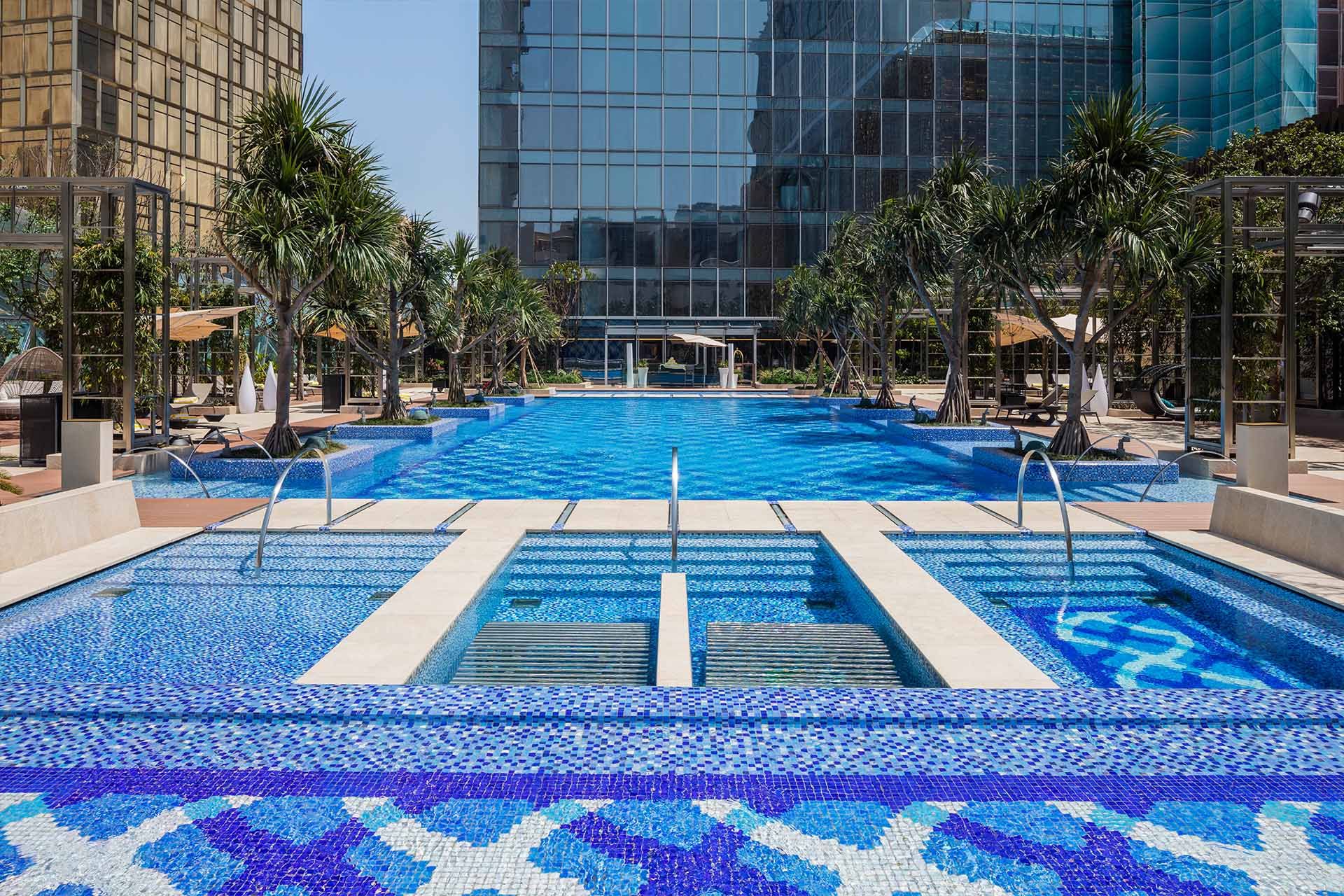 Rooftop pool at MGM COTAI in Macau, offering luxury wellness, leisure and resort-style relaxation.