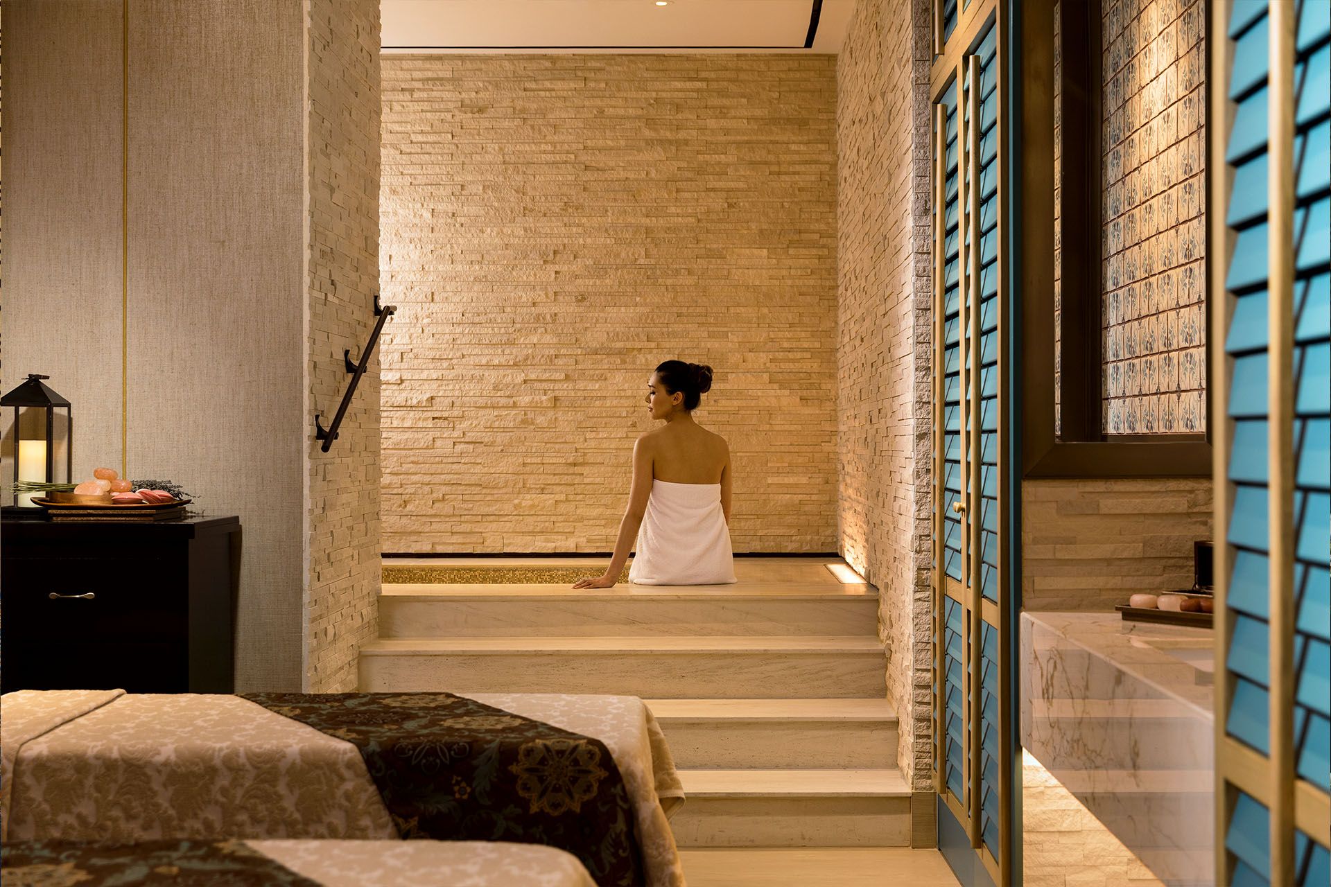 Luxury wellness experience at TRIA at MGM MACAU, with a private spa suite, calming stone design and restorative resort atmosphere.
