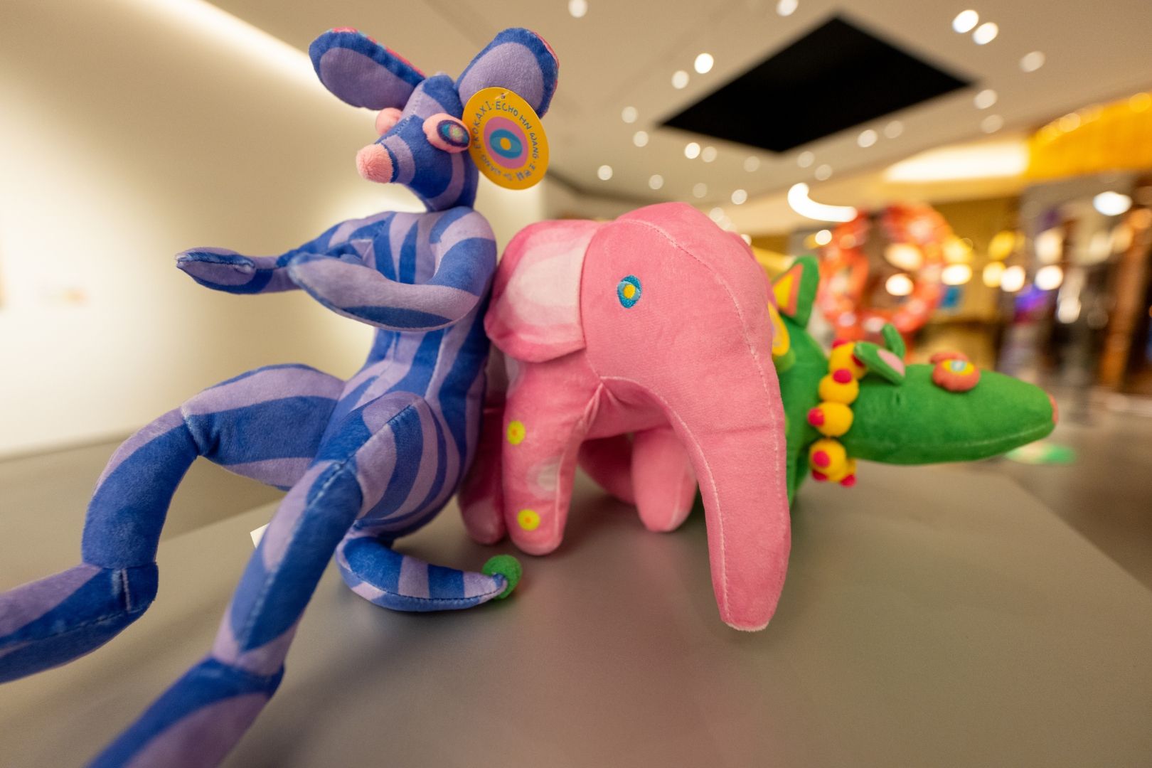 Limited-edition “Echo the Wind Wanderer” collectible gifts on display at MGM COTAI, featuring whimsical character plush toys inspired by the Macau International Children’s Arts Festival exhibition.