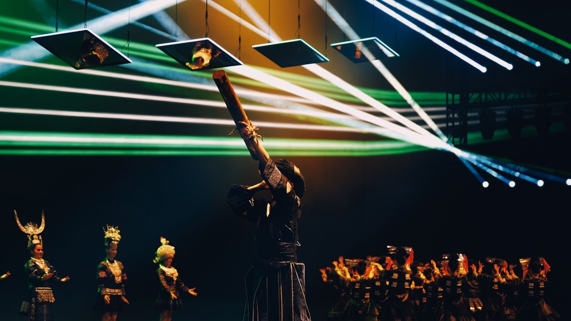 Miao Songs | Transcendent” in “MACAU 2049” features traditional Miao folk singing enhanced by kinetic mirror technology, creating ethereal beams of light and multidimensional visual effects.
